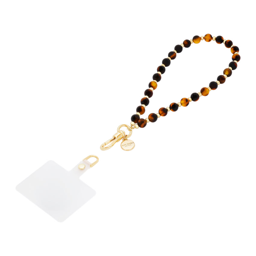 สายคล้องข้อมือ Phone Charm ลาย Tortoise แบรนด์ KATE SPADE