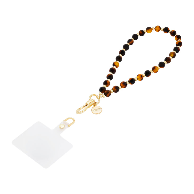 สายคล้องข้อมือ Phone Charm ลาย Tortoise แบรนด์ KATE SPADE